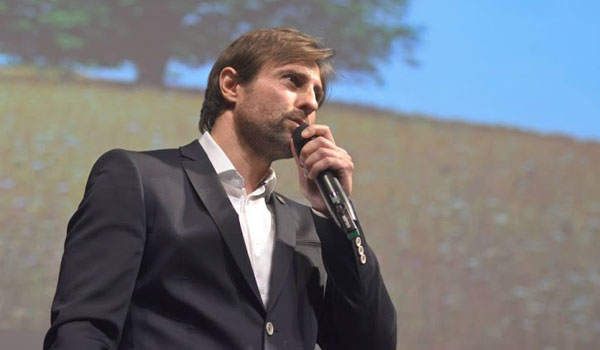 Vladimír Drozd, majitel značky Ramissio, mluví k publiku na eventu Rise and Shine